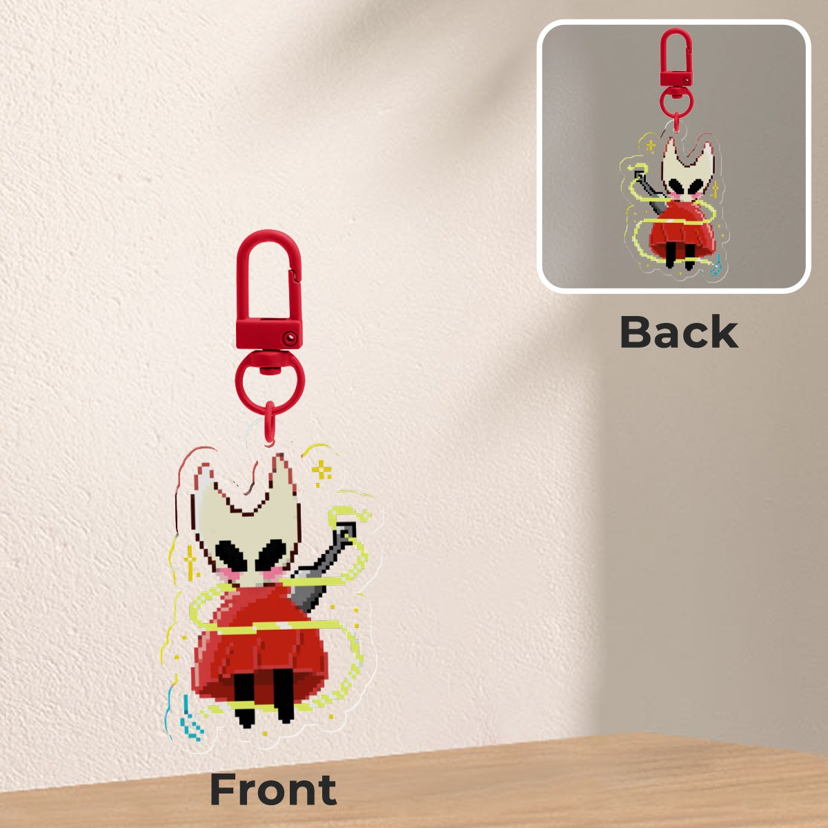Keychain with cartoon character on front and back, on a neutral background